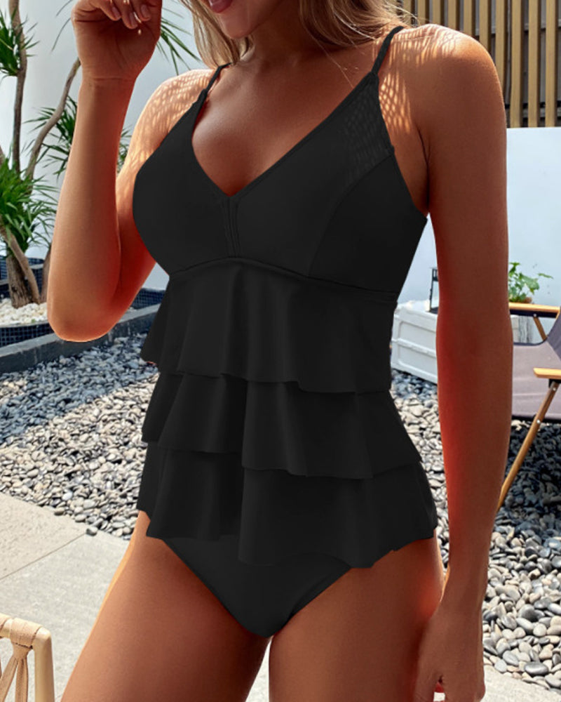 Lia - Effen badpak met elegante ruffles