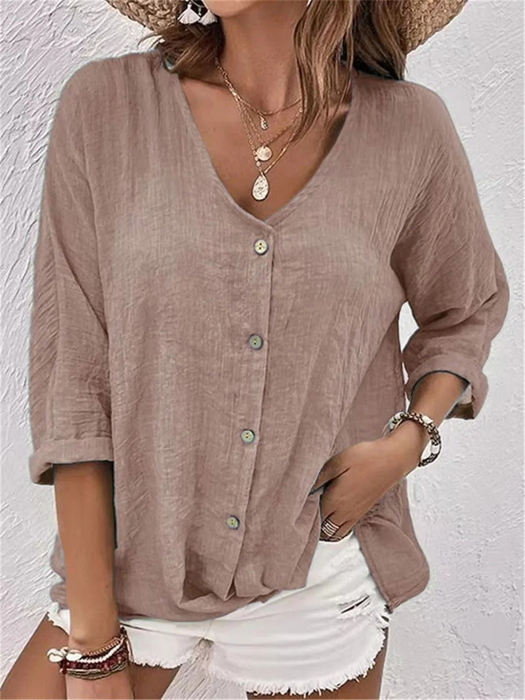 Liva – Blus med V-hals och knappar