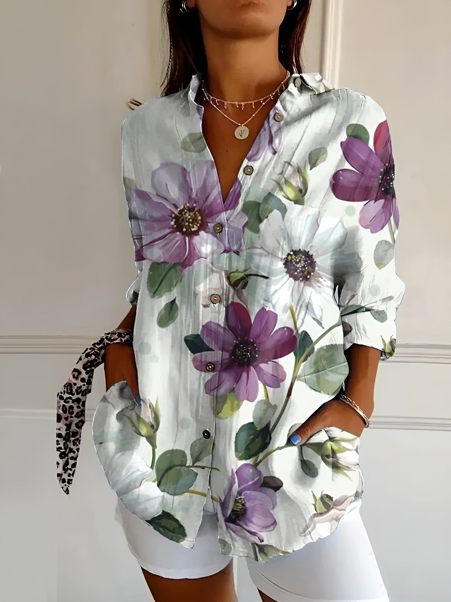 DESIREE I BLOEMENBLOUSE MET KNOPPENRIJ