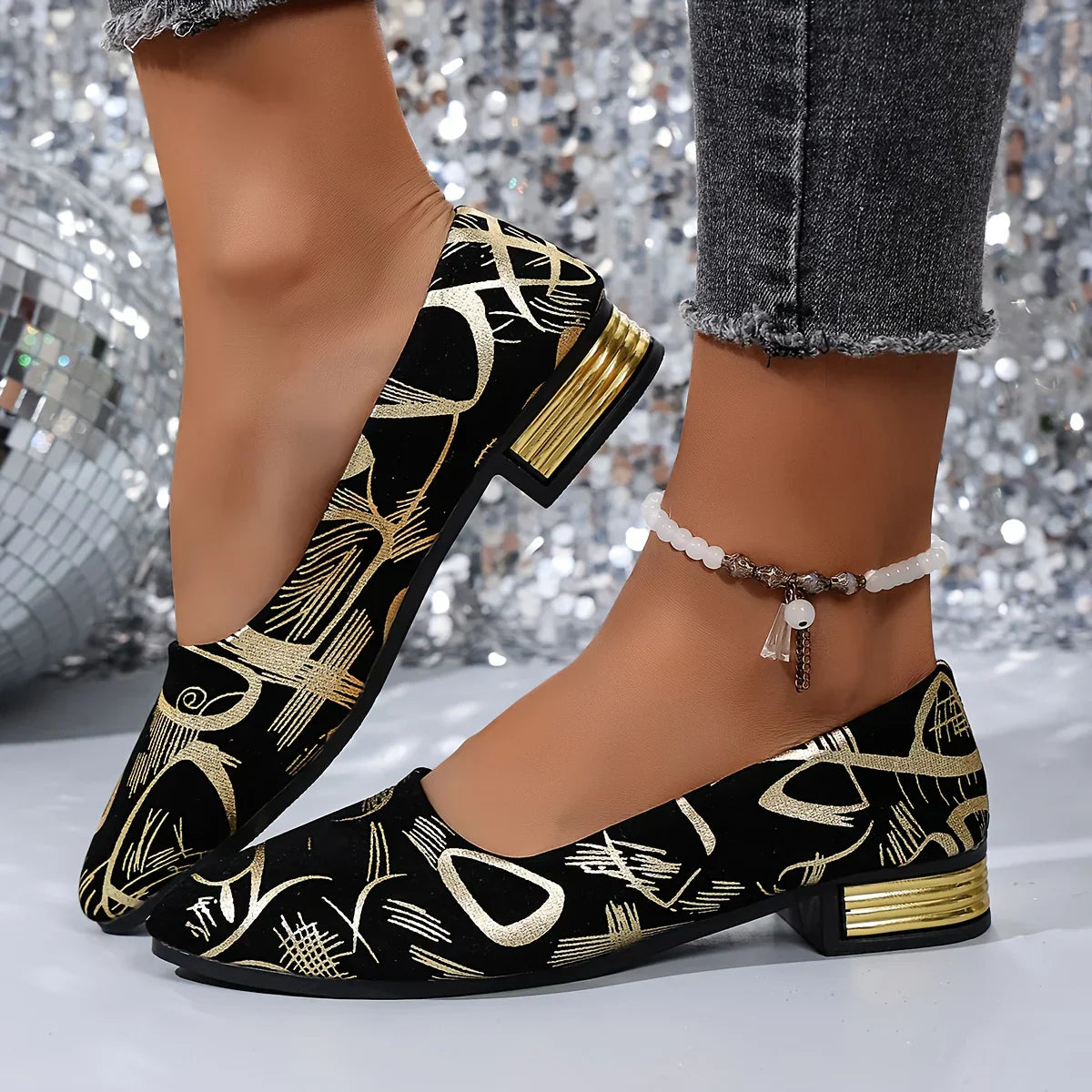 Ava – Loafers met gouden accenten