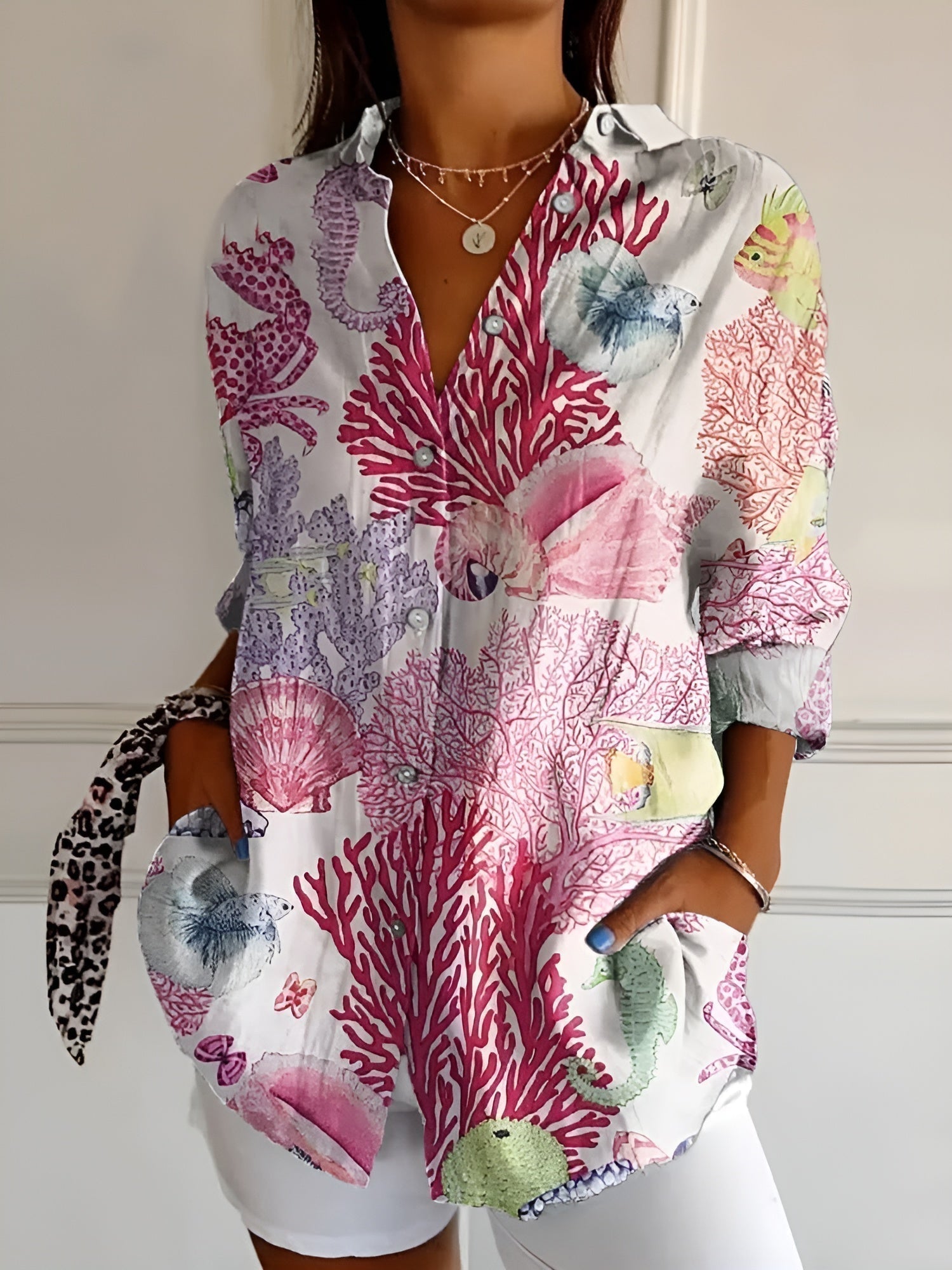 DESIREE I BLOEMENBLOUSE MET KNOPPENRIJ